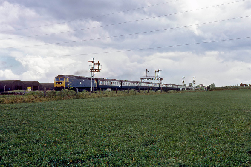 47055, 10.27 London Paddington-Paignton (1B56), Silk Mill 
 47055 accelerates past Fairwater Yard passing Silk Mill Crossing signal box's semaphores. It is leading the 10.27 Paddington to Paignton 1B56 service. This Class 47 is still on the mainline today as 57304 'Pride of Cheshire' owned and operated by DRS following its work for Virgin as a Thunderbird named 'Gordon Tracy'. I have a number of pictures taken locally of this locomotive. For example, see..... https://www.ontheupfast.com/p/21936chg/28642194804/x57304-british-gp-special-london 
 Keywords: 47055 10.27 London Paddington-Paignton 1B56 Silk Mill 57304 Pride of Cheshire Gordon Tracy Thunderbird