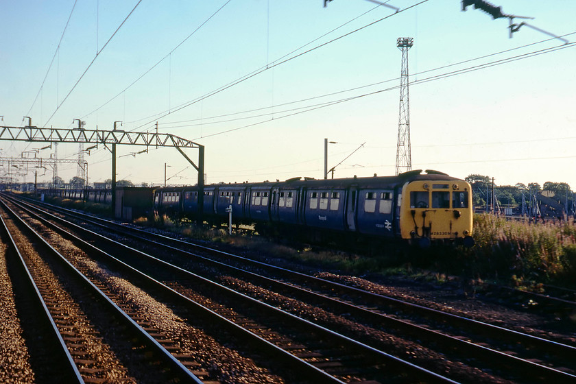 M28350, M28349, M28341 & M28339, awaiting disposal, Basford Hall 
 A line up of retired Merseyrail class 502 units are seen stored south of Crewe at Basford Hall. These units were built between 1939 and 1941 by the LMS at Derby Works for use on the Liverpool Exchange to Southport and Ormskirk routes. They replaced the L&Y units that had been operating since the lines opened. All the 502 were withdrawn by 01.09.80 with their 503 cousins that operated on the Wirral lines succumbing a few years later. In this view, M28350, M28349, M28341 M28339 are seen. They were taken away to various sites for storage and eventual cutting. For example, I saw some at Whittlesey in 1980. 
 Keywords: M28350 M28349 M28341 M28339 Basford Hall.