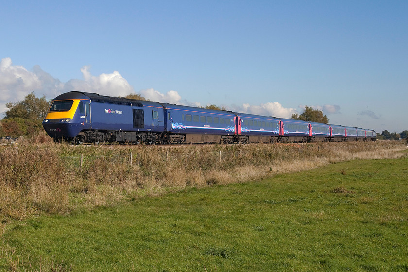 43182 & 43165, GW 11.30 London Paddington-Bristol Temple Meads (1C12), Ashbury Crossing SU246878 
 43182 leads an immaculate set of stock with 43165 'Prince Michael of Kent' on the rear past Ashbury Crossing near Shrivenham in west Oxfordshire. This lovely spot on the GWML, that has been a favourite with photographers such as Martin Loader (http://www.hondawanderer.com/index.htm) for many years, will soon change irrecoverably once the electrification masts arrive. 
 Keywords: 43182 43165 11.30 London Paddington-Bristol Temple Meads 1C12 Ashbury Crossing SU246878