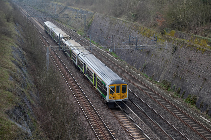 319457, LN 09.24 Bletchley CS-Northampton EMD ECS (5N19), Roade Cutting 
 A regular Saturday morning working on the southern end of the WCML is the 09.24 Bletchley Carriage Sidings to Northampton EMD (Kingsheath) that runs as 5N19. It is always a class 319, one of the few that London North Western inherited from London Midland. Here, 319457 heads through Roade Cutting with this ECS turn. 
 Keywords: 319457 5N19 Roade Cutting