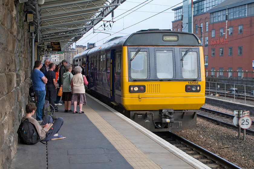 142088, NT 15.24 Newcastle-Carlisle (2N37), Newcastle station 
 A fair few passengers are seen on Newcastle's platform eight waiting to board the 15.24 to Carlise being worked by Northern Train's 142088. It will be a rickety and bouncy old journey along the Tyne Valley to Carlisle and one that will take sometime given that the 2N37 is the all stations stopper! 
 Keywords: 142088 15.24 Newcastle-Carlisle 2N37 Newcastle station Northern Trains Pacer