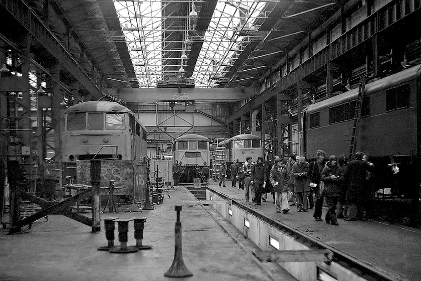 Various electrics, Crewe Works 
 A number of AC electrics are seen in various states of repair and overhaul inside Crewe Works. A quick glance around this picture illustrates the different approach to health and safety at this time. I do not cite this as a criticism but maybe as a comment about the perceived lack of common sense that exists today and of the litigious world that we, unfortunately, live in? 
 Keywords: Various electrics Crewe Works