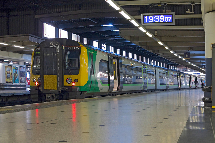 350375, LM 19.49 London Euston-Birmingham New Street (1Y79, 3L), London Euston station 
 Our train home waits at platform six at Euston station. 350375 is the lead unit of an eight-car unit that will work the 19.49 to Birmingham new Street. This is our train of choice as it offers a reasonable off-peak fare and is quick running non-stop to Leighton Buzzard on the down fast. Then, it only stops at Milton Keynes and Wolverton before reaching Northampton in about an hour. 
 Keywords: 350375 1Y79 London Euston station