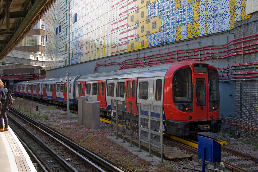 21362, stabled, Edgware Road LU station 
 One of the relatively new S Stock sets, 21362 sits stabled in the daylight at Edgware Road station. Introduced from 2010 there are numerous sub-classes of the S Stock (S for Suburban) that operate on the Metropolitan, Hammersmith & City, Circle and District lines. 
 Keywords: 21362 stabled Edgware Road London Underground station