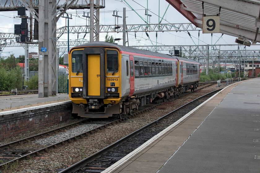 153913 & 153303, 13.54 Chester-Crewe for 14.25 Crewe-Chester (14.25 Crewe-Chester) (1D58, 1E), Crewe station 
 153913 and 153303 arrive at Crewe station working the 13.54 from Chester. My wife and would take these units back to Chester as the 1D58 14.25 from Crewe. I really do think that what is essentially a shuttle service between Crewe and Chester with no intermediate stations should be handled by something more substantial than two single-car units coupled together. Both the incoming service and the one that we travelled on was uncomfortably busy. In addition, we left slightly late due to a protracted discussion between the guard and five cyclists three of whom were refused access to the train with their bikes despite having booked them. A particular bugbear of mine is the way that cyclists are treated on the railways in this age. They really must do so much better to accommodate cyclists as leisure travel is now fast becoming more important to their revenue stream post-COVID19 and rather than viewing passengers with bikes as a hindrance, they should be welcomed on board. Incidentally, after further discussions, all the cyclists were permitted to travel on this service with their trusty steads! 
 Keywords: 153913 153303 13.54 Chester-Crewe for 14.25 Crewe-Chester 1D58 Crewe station TfW Transport for Wales