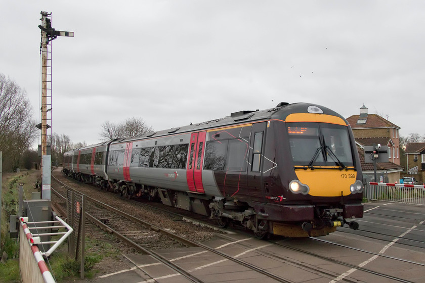 170398, XC 11.25 Stansted Airport-Birmingham New Street (1N53, RT), March South Junction 
 170398 forms the 11.25 Stansted Airport to Birmingham New Street. It is seen going over Creek Road level crossing in March, better known as March South Junction. 
 Keywords: 170398 11.25 Stansted Airport-Birmingham New Street 1N53 March South Junction