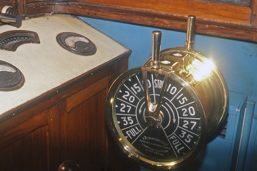 MV Farringford, engine order telegraph, bridge 
 A common site on ships that is familiar to even us non-mariners is the classic brass engine order telegraph (EOT) device. It is a device used by the person manning the bridge to communicate with the engineman down below in the engine room. It is connected electronically to its twin down below decks and rings a bell when an adjustment is made. However, this one is a little different without the usual markings, can anybody nautical please educate me? 
 Keywords: MV Farringford engine order telegraph bridge EOT