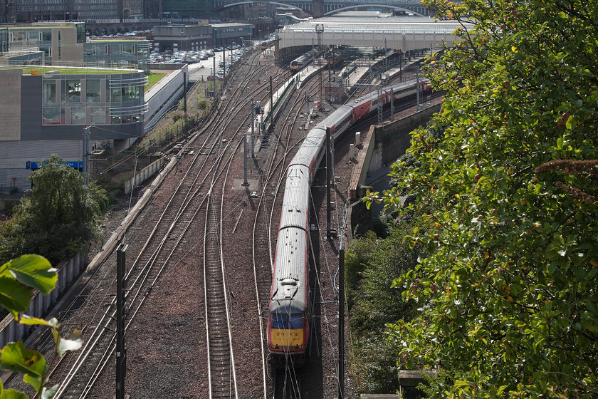 82226, GR 16.30 Edinburgh Waverley-London King`s Cross (1E23), top of Jacob`s Ladder 
 DVT 82226 leads the 1E23 16.30 Edinburgh to King's Cross out of Waverley station. The picture is taken from the top of Carlton North tunnel. This image shows the much simplified track layout in the throat of Waverley station. However, the increasing number of trains being forced through, what is essentially a double track layout, is causing some problems now. The situation has been exacerbated by the number of Border's Railway services using this route. 
 Keywords: 82226 16.30 Edinburgh Waverley-London King`s Cross 1E23 top of Jacob`s Ladder