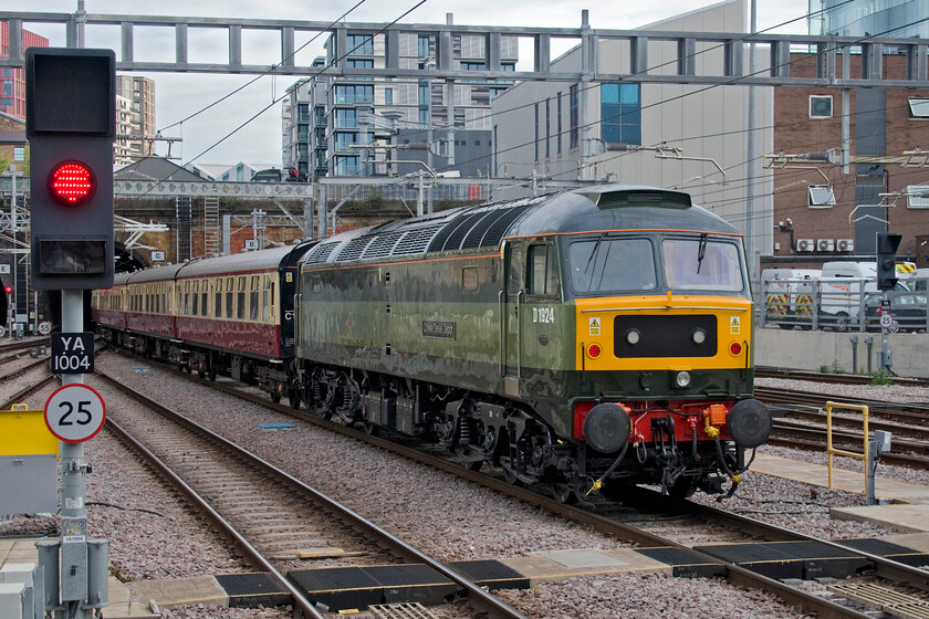 D1924, outward leg of the London to Castle Howard, Durham, Beamish & Newcastle, 08.15 London King's Cross-Newcastle (1Z90, RT), London King's Cross station 
 D9124 'Crewe Diesel Depot' brings up the rear of the oddly named London to Castle Howard, Durham, Beamish and Newcastle charter as it leaves an eerily quiet King's Cross station. The cause of the normally busy station being so quiet was yet another day of ASLEF industrial action with the charter being one of four trains that I saw in the station in about half an hour only two of which were actually operating! The condition of the stock and of D1924 itself is another example of the efforts that LSL (Crewe) go to to maintain their assets 
 Keywords: D1924 London to Castle Howard, Durham, Beamish & Newcastle 08.15 London King's Cross-Newcastle 1Z90 London King's Cross station Crew Diesel Depot LSL Statesman Rail