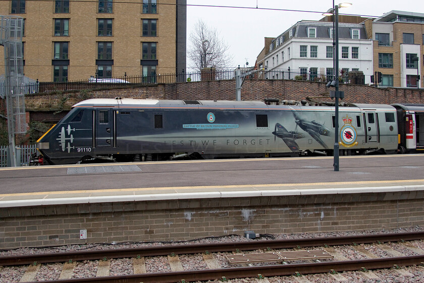 91110, GR 17.03 London King's Cross-Leeds (1D23, 14L), London King's Cross station 
 A broadside view of 91110 Battle of Britain Memorial Flight as it stands at King's Cross' platform zero. Introduced into service in April 1988 as 91001 this member of the class has worn this striking livery since 2012 and is likely to do so while it remains in service. However, as the first member of the class, it is likely to enter preservation so what livery it will wear then is up for debate. 
 Keywords: 91110 17.03 London King's Cross-Leeds 1D23 London King's Cross station