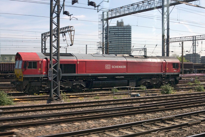 66097, stabled, Wembley Yard 
 66097 stabled in Wembley Yard taken as we pass on the 08.33 Birmingham new Street to Euston. 
 Keywords: 66097 stabled Wembley Yard