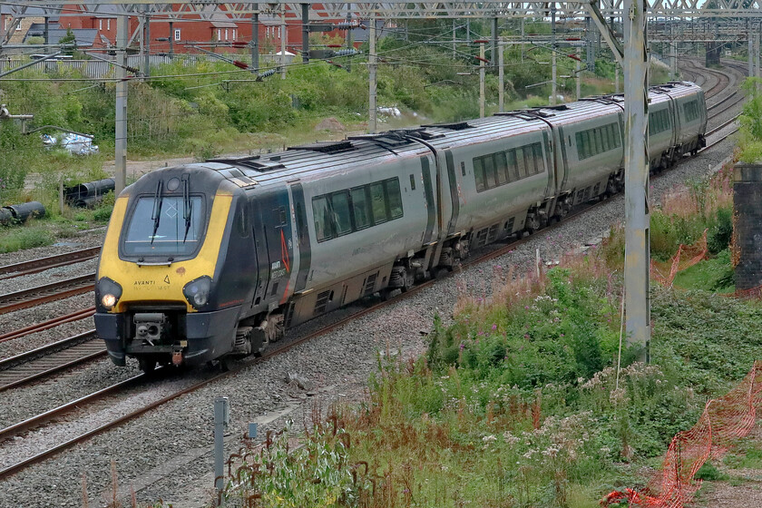 221110, VT 12.02 London Euston-Chester (1D86, 2E), site of Roade station 
 Whilst I have a particular dislike of the Voyager class (be they 220 or 221) I have been making a point of photographing them when out locally on the lineside as soon they will be history. AWC's 221110 passes Roade working the 12.02 Euston to Chester service. 
 Keywords: 221110 12.02 London Euston-Chester 1D86 site of Roade station AWC Avanti Voyager