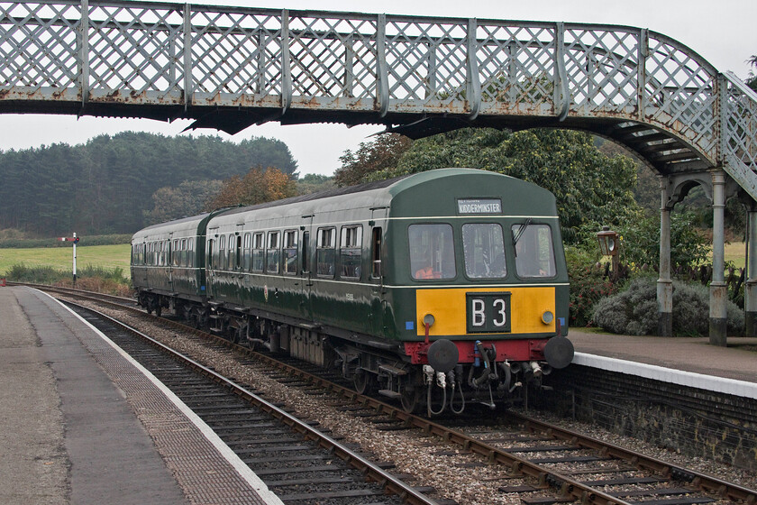 E51188 & E56062, 10.40 Sheringham-Holt, Weybourne station 
 One of the North Norfolk Railway's resident Class 101 DMU sets arrives at Weybourne station. Working the 10.40 Sheringham to Holt service E51188 (leading) and E56062 (trailing) will have a wait for the balancing working from Holt to arrive and for the tokens to be exchanged. Many examples of these units have entered preservation with the class widely recognised as being some of the most successful and longest-lived of BR's First Generation DMUs. 
 Keywords: E51188 E56062 10.40 Sheringham-Holt Weybourne station Class 101 DMU