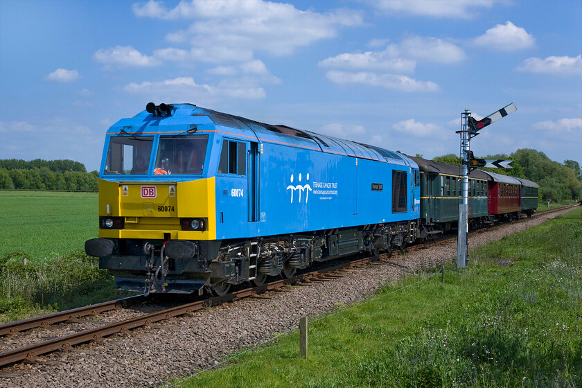 60074, 13.30 Peterborough NV-Wansford (2M49), Ailsworth TL109979 
 One of the mainline registered visiting locomotives to this diesel gala was 60074 'Teenage Spirit' carrying the distinctive colours of the Teenage Cancer Trust. The locomotive was specially painted and named to commemorate DB's association with the excellent charity that works to support young people who have cancer. The train is seen on the approach to Wansford leading the 13.30 Peterborough to Wansford train. 
 Keywords: 60074 13.30 Peterborough Nene Valley-Wansford 2M49 Ailsworth TL109979 Teenage Spirit