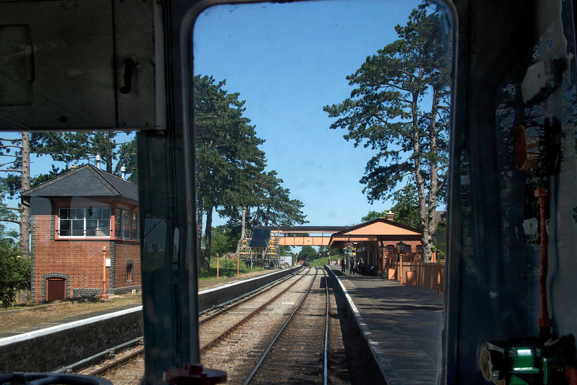 W51360, 13.50 Broadway-Cheltenham racecourse, Broadway station 
 Taken from a familiar position that we all enjoyed a generation of DMU ago, the superbly recreated Broadway station is seen from the rear of class 117 DMU car W51360. There is still work to do at the station, not least the completion of the traditional, but new build, footbridge. Once it opens and the signalling is completed, proper two platform operation can commence further enhancing the appeal of the northern terminus of the railway. Mike and I took this DMU service, the 13.50 departure, back to Toddington. 
 Keywords: W51360 13.50 Broadway-Cheltenham racecourse Broadway station