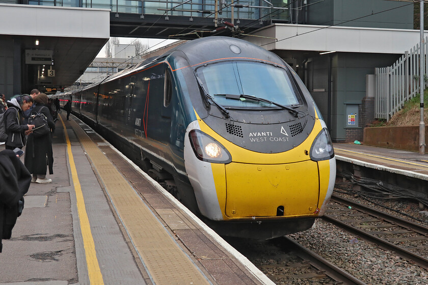 390046, VT 07.16 London Euston-Blackpool North (9P47, RT), Coventry station 
 Our second train taking us from Coventry to Preston arrives worked by Avanti's 390046. This, I believe, is my first trip on a direct Euston to Blackpool North since they were taken over by Pendolinos following the completion of the electrification to the Lancashire resort. After the relatively empty previous train that we took from Northampton, the Pendolino was relatively full with what appeared to be more leisure travellers. 
 Keywords: 390046 07.16 London Euston-Blackpool North 9P47 Coventry station Avanti West Coast Pendolino