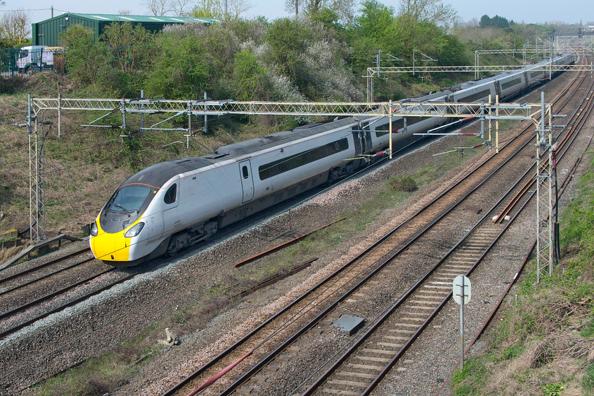 390040, VT 09.56 Liverpool Lime Street-London Euston (1A20, 13L), Victoria bridge 
 390040 sweeps around the curve at Victoria bridge near to the village of Roade heading southwards with the 09.56 Liverpool Lime Street to Euston. Unusually for the present times, with the emergency timetable in place and with nearly all trains running to time or even early, this working was running late throughout its whole journey arriving thirteen minutes adrift. 
 Keywords: 390040 09.56 Liverpool Lime Street-London Euston 1A20 Victoria bridge Avanti West Coast Pendolino