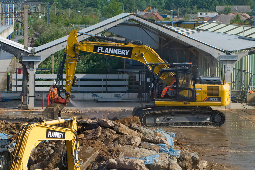 Demolition of old Northampton station 
 Contractors are at work pulling up the old floor of the station at Northampton. The concrete is going to be replaced by tarmac becoming part of the taxi rank and car park. 
 Keywords: Demolition of old Northampton station