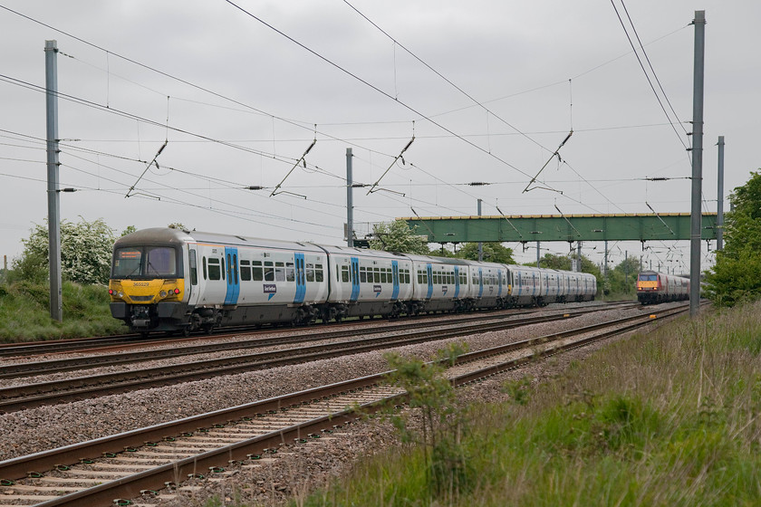 365529 & 365541, GN, 17.22 London Kings Cross-Peterborough (1P64, 1L) & 82213, GR 16.05 Leeds-London Kings Cross (1A40, 1L), Langford TL191396 
 As 365529 and 365541 head north with the 17.22 King's Cross to Peterborough whilst 82213 speeds south leading the 1A40 16.05 Leeds to King's Cross. The scene is recorded at Langford on the southern WCML. 
 Keywords: 365529 365541 1P64 82213 1A40 Langford TL191396