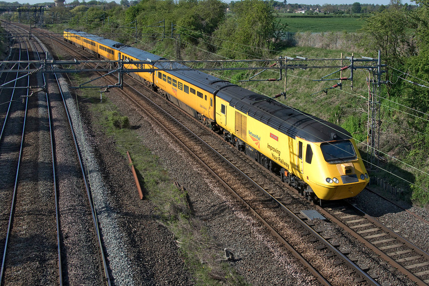 43062 & 43014, NR 14.24 Derby RTC-Derby RTC (1Q28, 40E), Victoria bridge 
 The last time that I saw this working was a very different day for so many reasons, see.... https://www.ontheupfast.com/p/21936chg/28656932604/x43013-43014-14-24-derby-rtc-derby Then it was the middle of winter and the world had not come to halt due to a global pandemic! 43062 'John Armitt' and 43014 'The Railway Observer' power the weekly 14.24 Derby to Derby via Euston and what seems like the rest of the network 1Q28 New Measurement Train working. Usually, it arrives back at its Derby base just before midnight but on this occasion, the technicians will have got a slightly early night as it arrived forty minutes early. Notice the slightly different version of yellow applied to the two power cars when compared to the converted Mk.III stock. 
 Keywords: 43062 43014 14.24 Derby RTC-Derby RTC 1Q28 Victoria bridge New Measurement Train HST John Armitt The Railway Observer