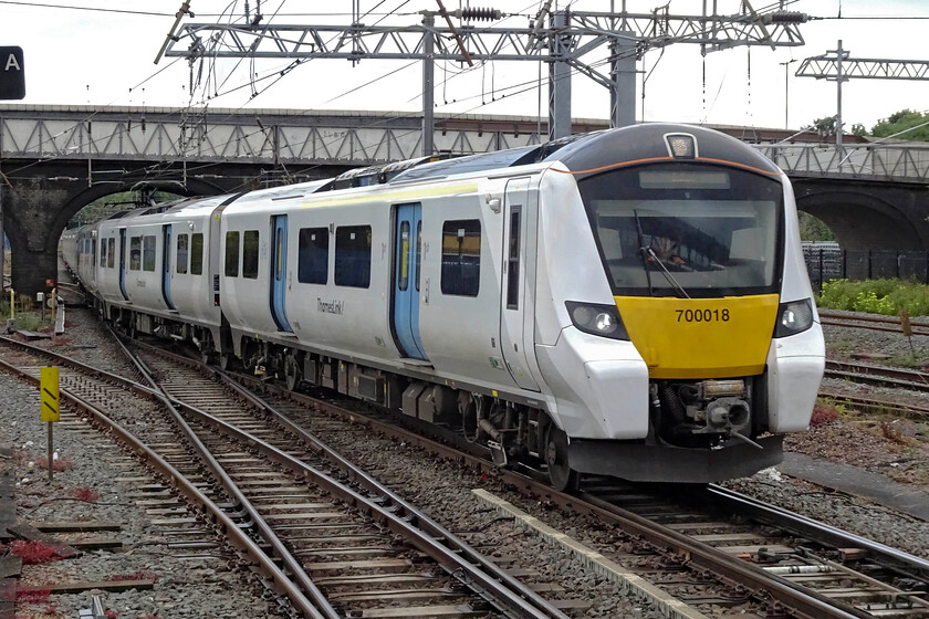 700018, TL 05.14 Three Bridges-Bedford (9R02, RT), Bedford station 
 The 05.14 Three Bridges to Bedford Thameslink service arrives at its destination worked by 700018. These Desiro City units have been in squadron service for six years now and are proving reliable. However, I must admit that the rather plain white livery with very limited branding does look a little bland when compared to the schemes applied by other operators. 
 Keywords: 700018 05.14 Three Bridges-Bedford 9R02 Bedford station