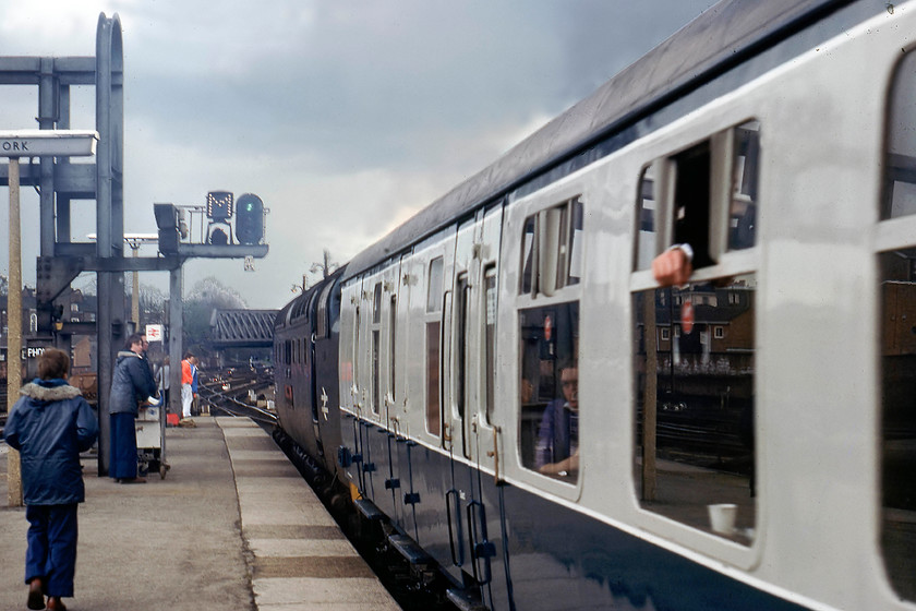 55006, 16.13 York-London King`s Cross (1A26), York station 
 A going-away shot of 55006 ' 'The Fife and Forfar Yeomanry' leading the 16.13 to King's Cross from York station. With Holgate bridge in the background, the picture is full of interest. There are plenty of spotters on the end of the platform two of whom have on their parka coats and flared jeans, all very de rigueur at the time! 
 Keywords: 55006 16.13 York-London King`s Cross 1A26 York station