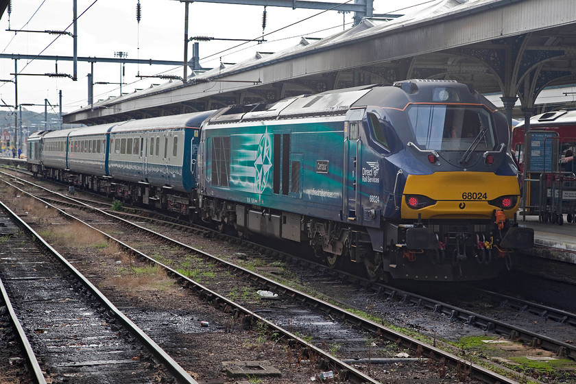 68024 & 68004, LE 12.05 Norwich-Lowestoft (2J74), Norwich station 
 Greater Anglia were still experiencing a chronic shortage of units so DRS were hired in to provide loco. hauled sets to supplement their timetable. At Norwich station, 68024 'Centaur' and 68004 'Rapid' top and tail the 12.05 Norwich to Lowestoft working. My Brompton bike and I took this train to Reedham thoroughly enjoying the Mk.IIA experience! 
 Keywords: 68024 68004 12.05 Norwich-Lowestoft 2J74 Norwich station