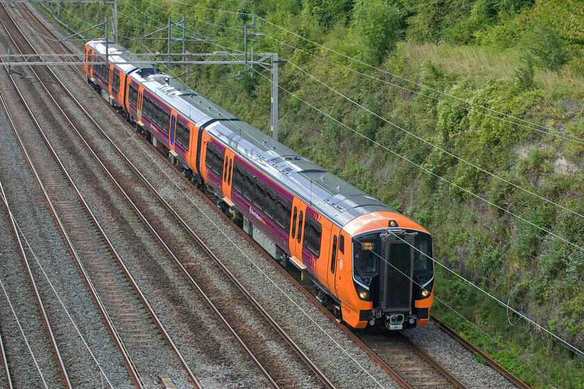 730013, 15.50 Soho LMD-Bletchley TMD (5Q13, 16L), Hyde Road bridge 
 Undertaking further testing, mileage accumulation and staff training runs West Midlands Trains' 730013 is seen passing Roade as the late running 5Q13 15.50 Soho Depot to Bletchley TMD. This is one of the three-car 7300XX sets of which forty-eight are due to enter service at the start of 2024 on the Birmingham Cross-City line enabling the withdrawal and cascading (of some) Class 323s. 
 Keywords: 730013 15.50 Soho LMD-Bletchley TMD 5Q13 Hyde Road bridge West Midlands Railway