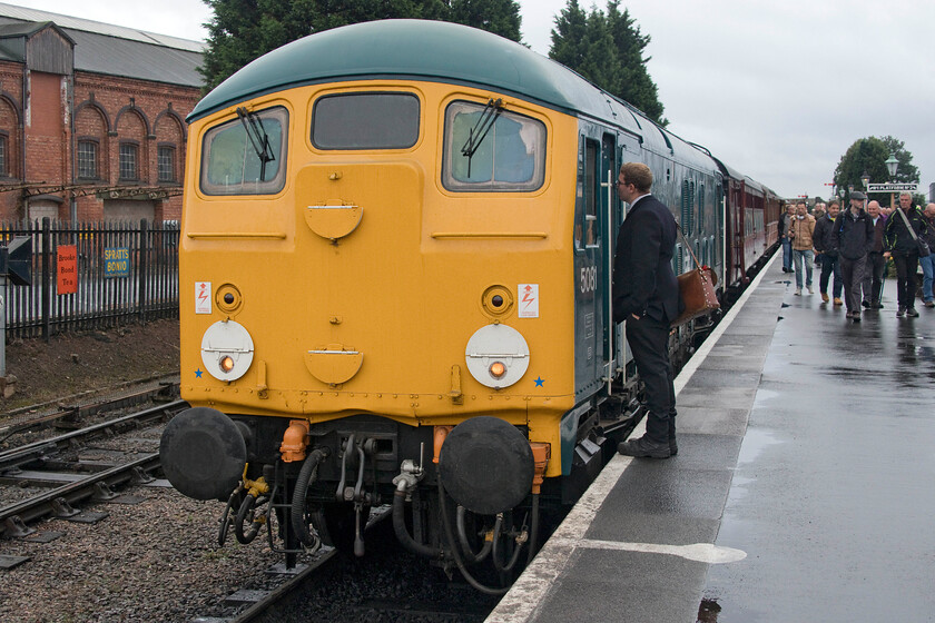 24081, 15.30 Bridgnorth-Kidderminster, Kidderminster SVR station 
 The final run of our outing on the Severn Valley Railway as part of their diesel gala was to travel behind 24081 (running in BR blue with yellow cab ends as 5081) leading the 15.30 Bridgnorth to Kidderminster. We took this train from Hampton Loade to its destination enjoying some welcome Sulzar sounds all the way! The history of 24081 has been written about many times but, as a reminder, it was the last member of the class to be withdrawn in October 1980 coming over a year after all the others had succumbed. Having become a celebrity survivor it was immediately preserved and is now privately owned and based at the Gloucestershire and Warwickshire Railway but spending more time doing the rounds of heritage lines rather than on its home line! 
 Keywords: 24081 15.30 Bridgnorth-Kidderminster Kidderminster SVR station 5081 Class 24