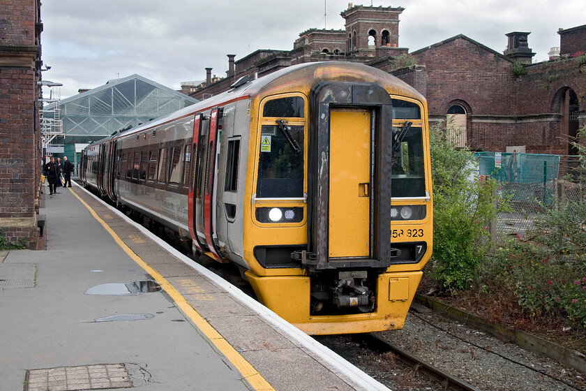 158823, AW 14.34 Holyhead-Cardiff Central (1V97, 1L), Chester station 
 Up for imminent replacement.

158823 waits at Chester station working the 14.34 Holyhead to Cardiff Central TfW service. Along with a number of units the Class 158 Super Sprinters are to be replaced next year by the Class 197 units currently undergoing testing, staff training and mileage accumulation runs. 
 Keywords: 158823 14.34 Holyhead-Cardiff Central 1V97 Chester station