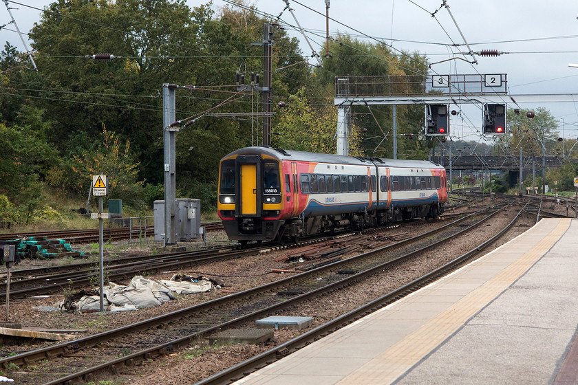 158813, 09.52 Liverpool Lime Street-Norwich (1L08, 18L), Norwich station 
 158813 arrives into Norwich station after completing its five hour journey from Liverpool where it left at 09.52. A two-car DMU is a little disappointing on train like this, in years past, it would have been a rake of comfy Mk. I or Mk. II stock hauled by a class 31; how things have changed! 
 Keywords: 158813 09.52 Liverpool Lime Street-Norwich 1L08 Norwich station