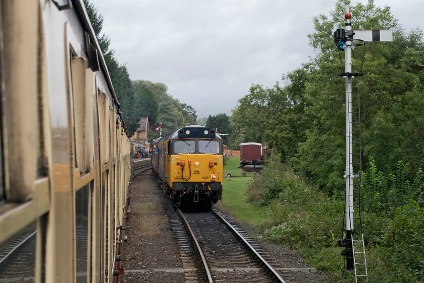 50007, 11.50 Bridgnorth-Kidderminster, Hampton Loade station 
 As our train, led by D1015 'Western Champion' arrives at Hampton Loade station 50007 'Hercules' patiently waits leading the 11.50 Bridgnorth to Kidderminster service. Now wearing its non-authentic GBRf livery the 50 is mainline registered and sees regular outings on the mainline, indeed I saw it tearing along the WCML a few weeks previously along with 50049 'Defiance', see...... https://www.ontheupfast.com/p/21936chg/30017120846/x50007-50049-thanet-thunderer-06 
 Keywords: 50007 11.50 Bridgnorth-Kidderminster Hampton Loade station Hercules