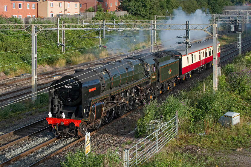 70000, 03.30 Crewe HS-Southall Loco Services LTD (5Z70, 18E), site of Roade station 
 Passing the site of Roade's former station, as it will have done many times in its fifteen-year mainline working career, 70000 'Britannia' makes light work of the 03.30 Crewe HS to Southall Loco Services light engine move. The next day Britannia would work Steam Dreams' The Garden of England Lunchtime Tour and The Sunset Steam Express both starting and finishing at Victoria. 
 Keywords: 70000 03.30 Crewe HS-Southall Loco Services LTD 5Z70 site of Roade station Britannia