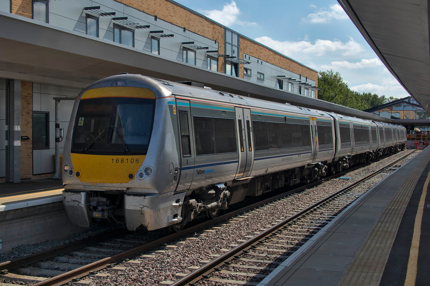 168106, CH 13.39 Oxford-London Marylebone (1Y45, 1L), Oxford station 
 After breaking my journey and nipping into the city centre I returned to catch the next leg of my somewhat contorted journey home. 168108 stands in the bay platform five that I would take as far as Bicester Village as the 13.39 to London Marylebone. It was as shame that on such a hot day most of the carriages did not have their air conditioning working, and with no windows to open this made for quite an unpleasant environment. 
 Keywords: 168106 13.39 Oxford-London Marylebone 1Y45 Oxford station