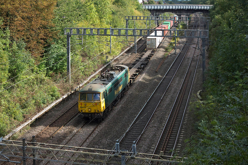 86614, unidentified down Freightliner, Hyde Road Bridge 
 In the middle of Roade Village, 86614 heads north with an unidentified Freightliner. This was a case of passing the bridge at the right time as I was out for a village walk on my day off. 
 Keywords: 86614 unidentified down Freightliner Hyde Road Bridge