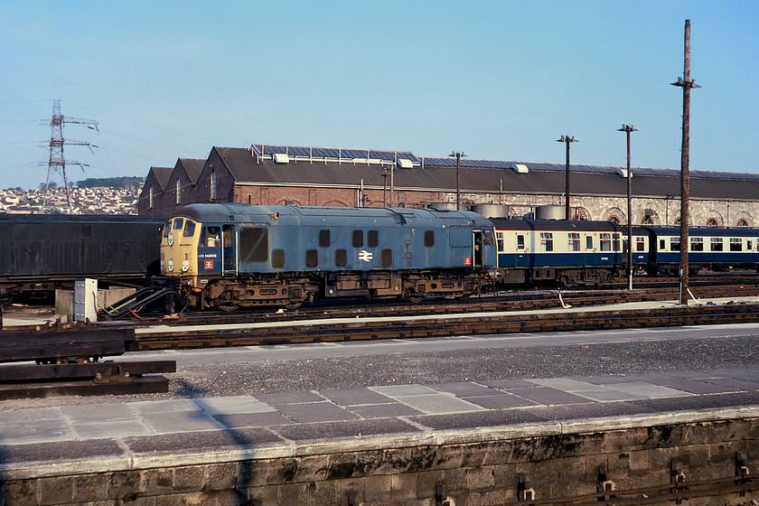 TDB97008 (ex 24054), pre-heater, Newton Abbot CS 
 One of the most unusual residents of Newton Abbot depot was the former 24054. On withdrawal by BR in July 1976 after a lengthy period of storage, it was tripped to Plymouth Laira during August. After modifications, it took up carriage heating duties at Penzance renumbered as TDB97008 to be moved to Newton Abbot during September 1977. It continued to be a carriage heater but, seeing less work as time moved on, it was transferred to Norwich Crown Point in 1982 after receiving a smart repaint at Stratford. However, due to complaints from local residents about noise during the night, it was moved to March facing a grim future. However, things looked up in 1983 when it was purchased by the fledgling East Lancashire Railway and moving to its new home in the autumn. It remains there to this date in the care of the Diesel Group and is a stalwart locomotive on the line. 
 Keywords: TDB97008 24054 pre-heater Newton Abbot CS carriage sidings