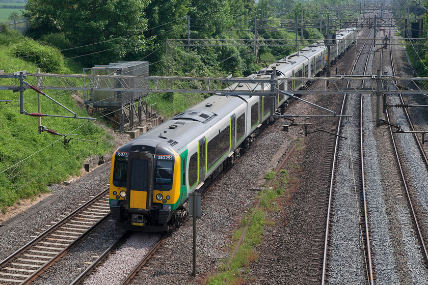 350255 & 350265, LN 12.14 London Euston-Coventry (2Y19, 1E), Victoria Bridge 
 London Northwestern 350255 and 350265 pass my local 'spot', Victoria Bridge, working the 12.14 London Euston to Coventry. This service, along with all other West Midlands train services, were terminating and starting from Coventry because of extensive bank holiday engineering works throughout the Birmingham area. 
 Keywords: 350255 350265 2Y19 Victoria Bridge