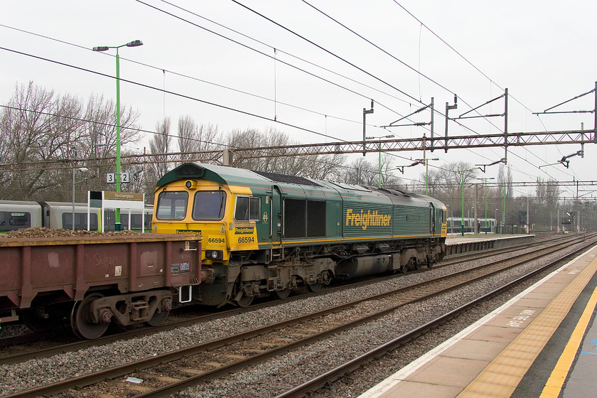 66594, 10.17 Hanslope Junction-Crewe Basford Hall (6Y60), Northampton station 
 66594 'NYK Spirit of Kyoto' passes through Northampton station leading a rake of MDA and MCA ballast wagons. This train was carrying a mixture of spoil and old ballast from the engineering work being undertaken around Hanlsope Junction as the 6Y60 10.17 to Crewe Basford hall. 
 Keywords: 66594 10.17 Hanslope Junction-Crewe Basford Hall 6Y60 Northampton station