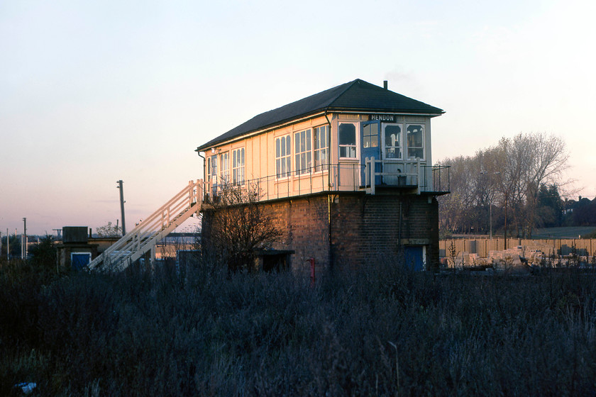 Hendon signal box (LMS, date not known) 
 With the sun getting low in the sky, Hendon signal box is seen from the rear. This is another LMS signal box but I have been unable to find out very little about it and even its date of construction. If anybody has any information it would be gratefully received. 
 Keywords: Hendon signal box