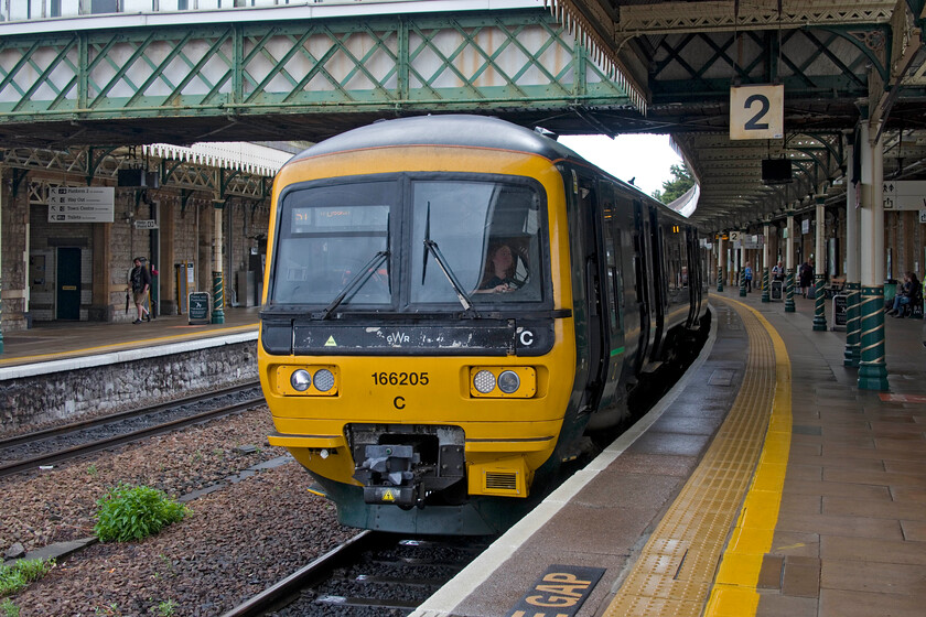 165205, GW 16.10 Weston-super-Mare-Severn Beach (2K46, 5L), Weston-super-Mare station 
 This is the second time that we have travelled aboard 165205 on this day touring the Bristol area having taken it out and back to Severn Beach earlier in the morning. The driver is preparing her train ready to work the 16.10 Weston-super-Mare to Severn Beach that Andy and I would take back to Bristol. Andy was particularly pleased to be on this service as it made a stop at the elusive Weston Milton station enabling him to alight, walk along the platform to the next carriage and rejoin the train to then be able to declare the station a cop! 
 Keywords: 165205 16.10 Weston-super-Mare-Severn Beach 2K46 Weston-super-Mare station GWR Turbo