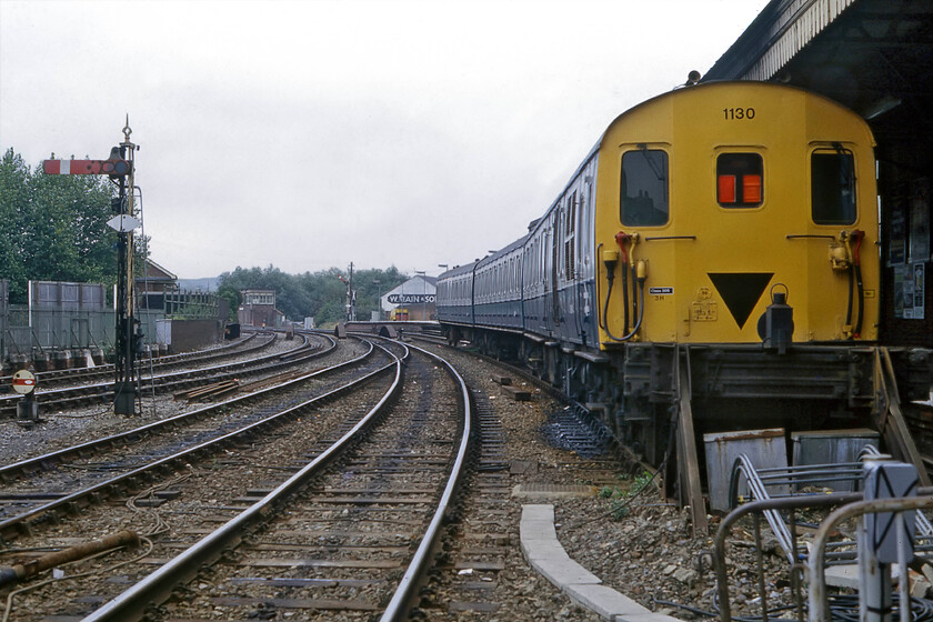 1130, stabled, Salisbury station 
 Class 205 DEMU 1130 stands at Salisbury station awaiting its next turn of duty. This particular unit sports the revised livery that sees it matching BR's corporate twin colour scheme of blue and grey. It wore this livery until taken into the care of Network SouthEast with withdrawal coming in November 1992. 
 Keywords: 1130 stabled Salisbury station Thumper DEMU Class 205