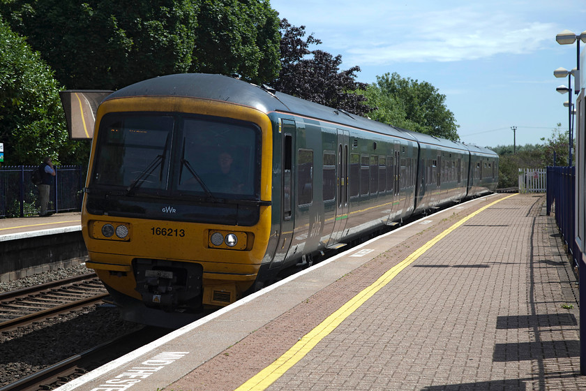 166213, GW 11.18 London Paddington-Bedwyn (1K50, 2L), Hungerford station 
 The small West Berkshire town of Hungerford is 61 miles from Paddington has a regular service that operates to and from the village of Bedwyn and Paddington. The station has seen a steady rise in passenger numbers over recent yeras and it has had some recent improvements carried out. 166213 drifts into the station with the 11.18 Paddington to Bedwyn. 
 Keywords: 166213 1K50 Hungerford station