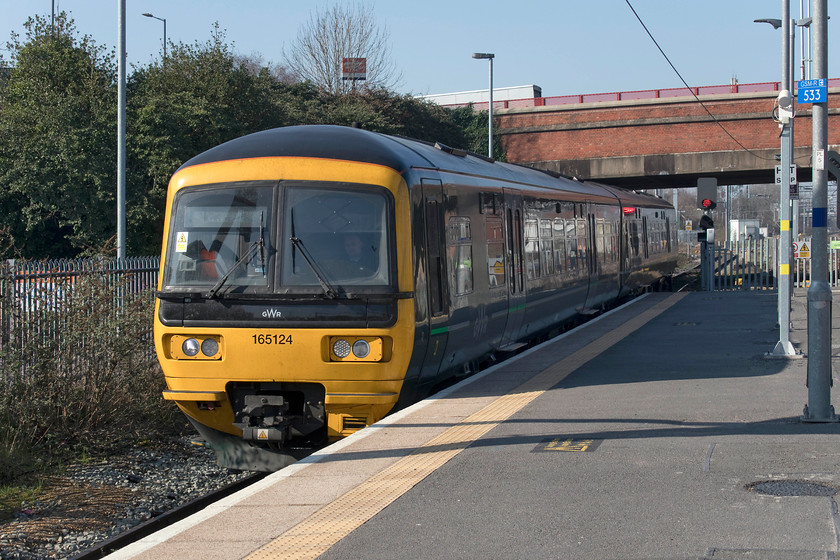 165124, GW 11.39 Windsor & Eton-Slough (2A19, RT), Slough station 
 165124 arrives at Slough's platform one with the 11.39 from Windsor and Eton. This unit was involved in a derailment in the throat of Paddington station on 18.06.16. It was extensively damaged but rebuilt as can be seen here. 
 Keywords: 165124 11.39 Windsor & Eton-Slough 2A19 Slough station