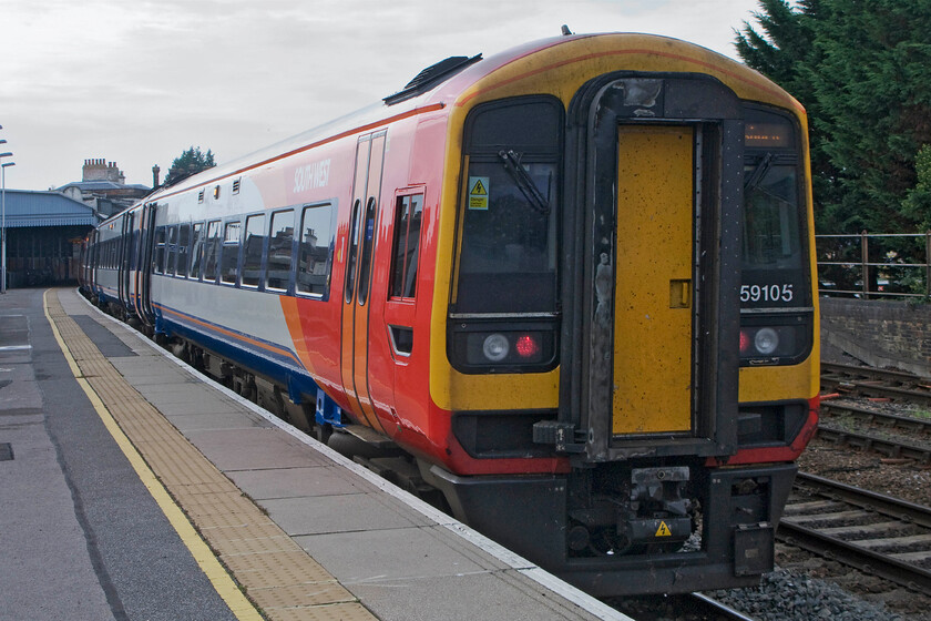 159105, SW 14.47 Salisbury-London Waterloo (1L50), Salisbury station 
 The 1L50 14.47 Salisbury to London Waterloo South West Trains' service will depart in about fifteen minutes from platform six. Salisbury is a busy station with services coming from all directions. Whilst the main operator is South West Trains, First Great Western also run trains through the station between Portsmouth and Bristol 
 Keywords: 159105 14.47 Salisbury-London Waterloo 1L50 Salisbury station SWT South West Trains