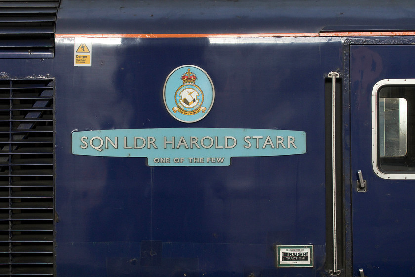 Nameplate, 43023, HT 18.48 London Kings Cross-Hull (1H06, 7L), London-KIng`s Cross station 
 Former GWR 43023 'Sqn Ldr Harrold Starr - one of the few' stands at the head of the 1H06 18.48 King's Cross to Hull. Still in its First Great Western paintwork, the HST set is being leased from Angel Trains to Hull Trains being off lease from the Western Region. I hope that the passengers appreciated the far superior environment of a Mk. III HST set rather than a noisy class 180 that ought to be working this service. If not, then they should at least appreciate the extra capacity afforded by an HST set, if a little shorter than normal. 
 Keywords: Nameplate 43023 18.48 London Kings Cross-Hull 1H06 London-KIng`s Cross station