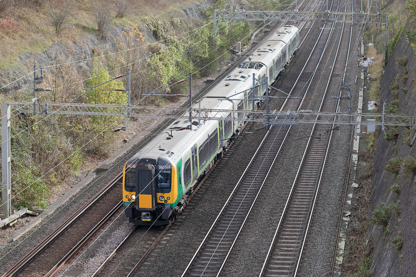 350257, LM 10.54 London Euston-Northampton (2N39), Roade cutting 
 350257 works the 10.54 Euston to Northampton through Roade cutting. A bit back lit but I like the lighting down in the depths of the cutting when the low sun is still able to illuminate it. 
 Keywords: 350257 10.54 London Euston-Northampton 2N39 Roade cutting