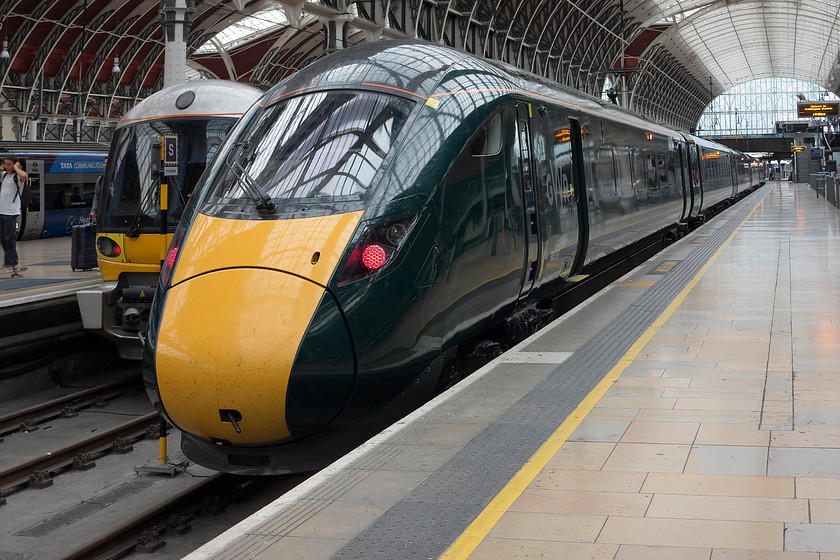 800307, GW 15.30 London Paddington-Weston-super-Mare (1C20, RT), London Paddington station 
 IET 800307 waits to leave Paddington working the 15.30 to Weston-super-Mare. This train will travel via the GWML through Reading, Swindon, Bristol and then to Weston. At the present time, it will run using electric power for about half the distance and then will switch to diesel power. When under diesel power, these 800s are not able to keep up with the HST timings. The forty year old HSTs both accelerate faster and will maintain a much higher and sustained maximum speed; progress.....hmmmm? 
 Keywords: 800307 1C20 London Paddington station