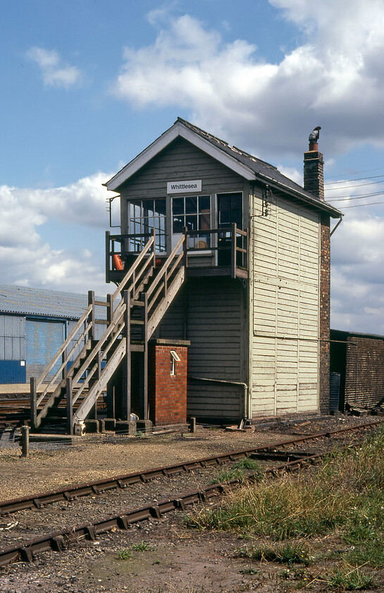 Whittlesea signal box (GE, 1887) 
 Whittlesey (or Whittlsea) depending on where you come from is a large village southwest of Peterborough. As well as a small station with offset platforms it boasts this large Great Eastern Type 7 box that opened in 1887. It is of a plain and simple design and certainly not as stylish as by way of an example of the nearby St. James Deeping box seen a little earlier. The box was due to close in 2020 but Network Rails plans to resignal the line east from Peterborough to March have been delayed with no date given for its abolition. 
 Keywords: Whittlesea signal box