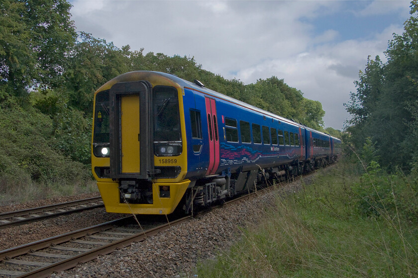 158956, GW 09.00 Brighton-Worcester Shrub Hill, Bradford-on-Avon number 2 crossing 
 158956 accelerates away from Bradford-on-Avon working the 09.00 Brighton to Worcester Shrub Hill service. This 1V94 is a bit of a curiosity with its two hundred mile journey starting in Sussex and ending in West Midlands taking a circuitous route that includes two reversals, one at Bristol and the other at Gloucester. 
 Keywords: 158956 09.00 Brighton-Worcester Shrub Hill Bradford-on-Avon First Great Western