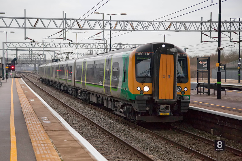 350118, LM 14.13 London Euston-Birmingham New Street (1Y45), Milton Keynes station 
 350118 drifts into Milton Keynes station forming the 14.13 Euston to Birmingham New Street. It was a very grey and dull Friday afternoon, typical of this time of year! 
 Keywords: 350118 14.13 London Euston-Birmingham New Street 1Y45 Milton Keynes station